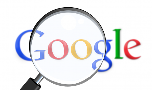google behind magnifying glass